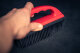 Brosse Spéciale - Brosse en caoutchouc avec poignée rouge